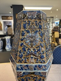 A rare Chinese hexagonal copper-red, blue and white brown-ground vase, 19th C.