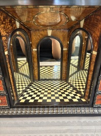 A small tortoiseshell-veneered cabinet of drawers with mirrored interior, Antwerp, 17th C.