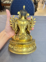 A fine Sino-Tibetan turquoise- and coral-inlaid gilt-bronze Buddha Maitreya, Kangxi