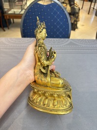 A fine Sino-Tibetan turquoise- and coral-inlaid gilt-bronze Buddha Maitreya, Kangxi