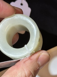 A fine Chinese white jade inscribed archer ring, Zigang 子岡 mark, 18th C.