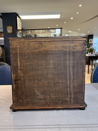A small tortoiseshell-veneered cabinet of drawers with mirrored interior, Antwerp, 17th C.