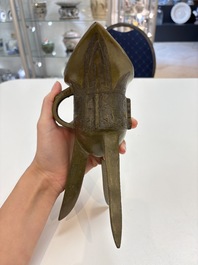 A Chinese archaic bronze wine vessel, 'jue 爵', late Shang