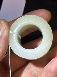 A fine Chinese white jade inscribed archer ring, Zigang 子岡 mark, 18th C.