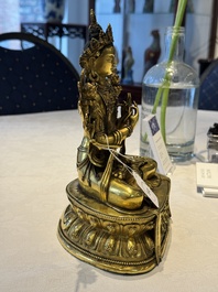 A fine Sino-Tibetan turquoise- and coral-inlaid gilt-bronze Buddha Maitreya, Kangxi