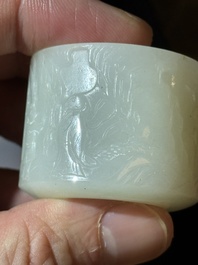 A fine Chinese white jade inscribed archer ring, Zigang 子岡 mark, 18th C.