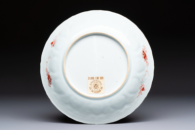 A Chinese iron-red and gilt-decorated 'Ode to the Red Cliff' dish, Kangxi