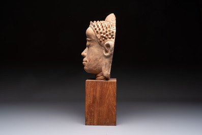 A Thai pottery Haripunjaya-style head of Buddha, possibly 13th C.