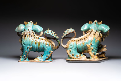 A pair of large Chinese polychrome-glazed Shiwan stoneware Buddhist lions, 19th C.