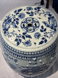 A Chinese blue and white 'birds among flowering branches' garden seat, 19th C.