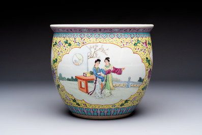 Seven Chinese famille rose vases, a scroll jar and a jardini&egrave;re on a stand, Qianlong marks, 20th C.