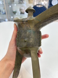 A Chinese archaic bronze wine vessel, 'jue 爵', late Shang
