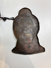 A Tibetan copper Gawu box and tsa tsa mold, 19th C.