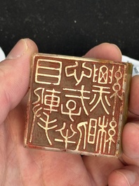 A Chinese celadon and russet jade 'dragon' seal, 18/19th C.