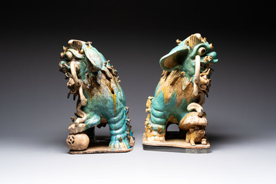 A pair of large Chinese polychrome-glazed Shiwan stoneware Buddhist lions, 19th C.