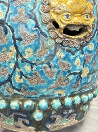 A Chinese Fahua barrel-shaped 'lotus scroll' stool with incised design, Ming