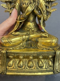 A fine Sino-Tibetan turquoise- and coral-inlaid gilt-bronze Buddha Maitreya, Kangxi
