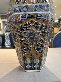 A rare Chinese hexagonal copper-red, blue and white brown-ground vase, 19th C.