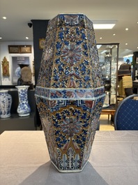 A rare Chinese hexagonal copper-red, blue and white brown-ground vase, 19th C.