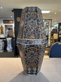A rare Chinese hexagonal copper-red, blue and white brown-ground vase, 19th C.