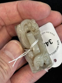 A Chinese celadon and russet jade 'chilong' seal, 18/19th C.