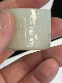 A fine Chinese white jade inscribed archer ring, Zigang 子岡 mark, 18th C.
