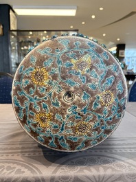 A Chinese Fahua barrel-shaped 'lotus scroll' stool with incised design, Ming