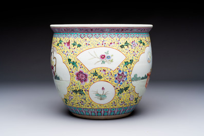 Seven Chinese famille rose vases, a scroll jar and a jardini&egrave;re on a stand, Qianlong marks, 20th C.
