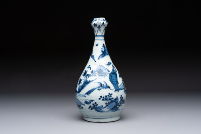 A rare Chinese blue and white 'Immortals' garlic-mouth bottle vase, Wanli/Tianqi
