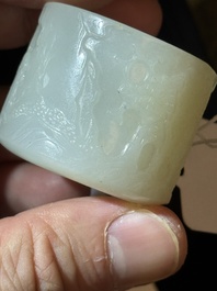 A fine Chinese white jade inscribed archer ring, Zigang 子岡 mark, 18th C.