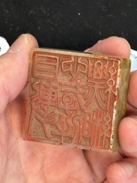 A Chinese celadon and russet jade 'dragon' seal, 18/19th C.