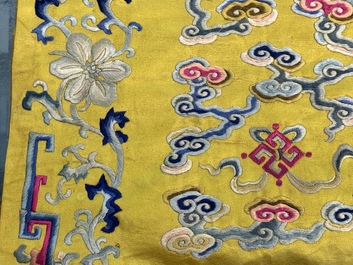 An imperial Chinese embroidered silk gold-thread yellow-ground cushion cover, Qianlong/Jiaqing