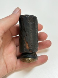 A Tibetan copper Gawu box and tsa tsa mold, 19th C.
