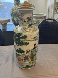 A fine Chinese famille verte 'Sanxing' rouleau vase with a gilt-bronze mount, Qing