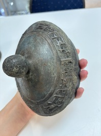 A Chinese archaic bronze food vessel, 'you 卣', Western Zhou