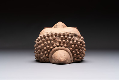 A Thai pottery Haripunjaya-style head of Buddha, possibly 13th C.
