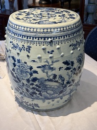 A Chinese blue and white 'birds among flowering branches' garden seat, 19th C.