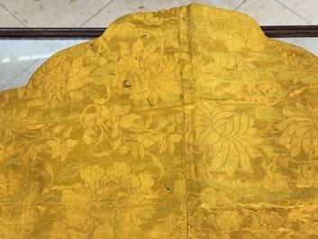 An imperial Chinese embroidered silk gold-thread yellow-ground cushion cover, Qianlong/Jiaqing