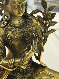 A fine Sino-Tibetan turquoise- and coral-inlaid gilt-bronze Buddha Maitreya, Kangxi