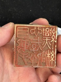 A Chinese celadon and russet jade 'dragon' seal, 18/19th C.