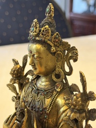 A fine Sino-Tibetan turquoise- and coral-inlaid gilt-bronze Buddha Maitreya, Kangxi