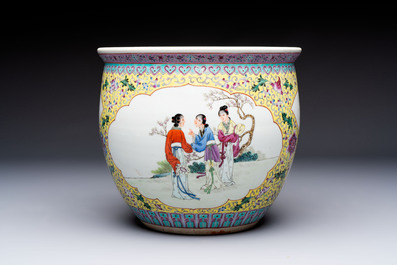 Seven Chinese famille rose vases, a scroll jar and a jardini&egrave;re on a stand, Qianlong marks, 20th C.