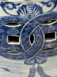 A Chinese blue and white 'birds among flowering branches' garden seat, 19th C.