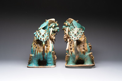 A pair of large Chinese polychrome-glazed Shiwan stoneware Buddhist lions, 19th C.