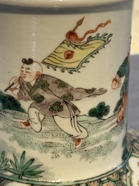 A fine Chinese famille verte 'Sanxing' rouleau vase with a gilt-bronze mount, Qing