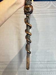 A finely carved boxwood 'vanitas' or 'memento mori' stick, 18/19th C.