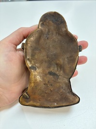 A Tibetan copper Gawu box and tsa tsa mold, 19th C.