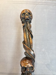 A finely carved boxwood 'vanitas' or 'memento mori' stick, 18/19th C.