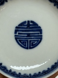 A pair of Chinese blue and white saucer dishes, Qianlong mark, 19th C.