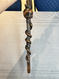 A finely carved boxwood 'vanitas' or 'memento mori' stick, 18/19th C.